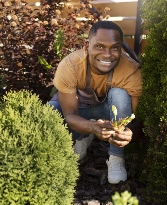 man enjoying indoor farming (2)